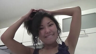 Cute Asian gets completely naked in the bathroom